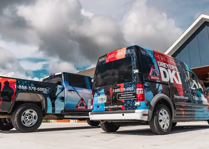 dreyer's dki trucks outside of building